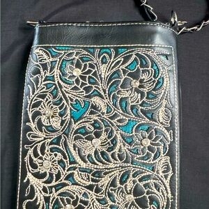 Rustic Couture Black Faux leather purse with chain strap.